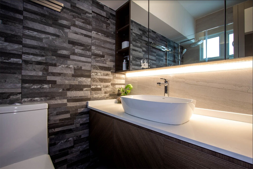 Spa themed modern style master bathroom with dark tiles